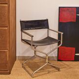 Folding cantilever chair in tubular metal
