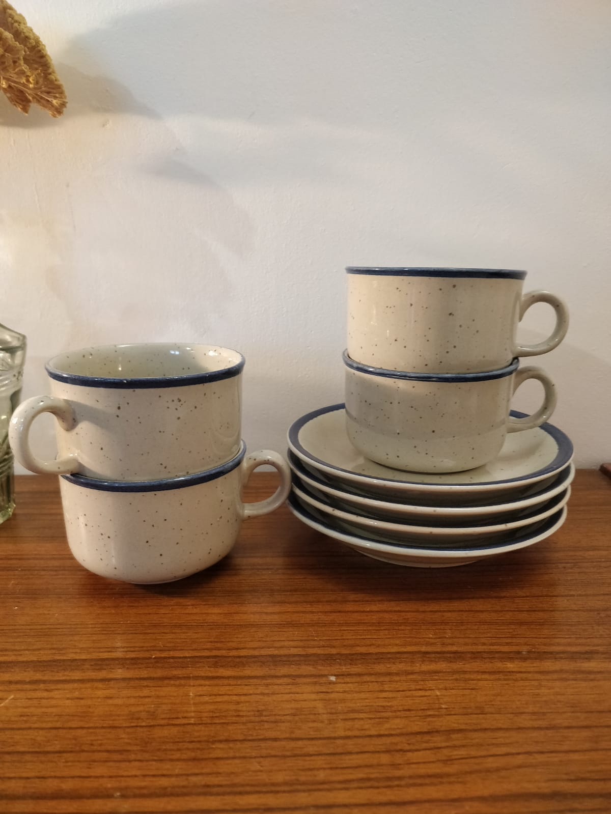 Four cups and their saucers