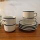 Four cups and their saucers