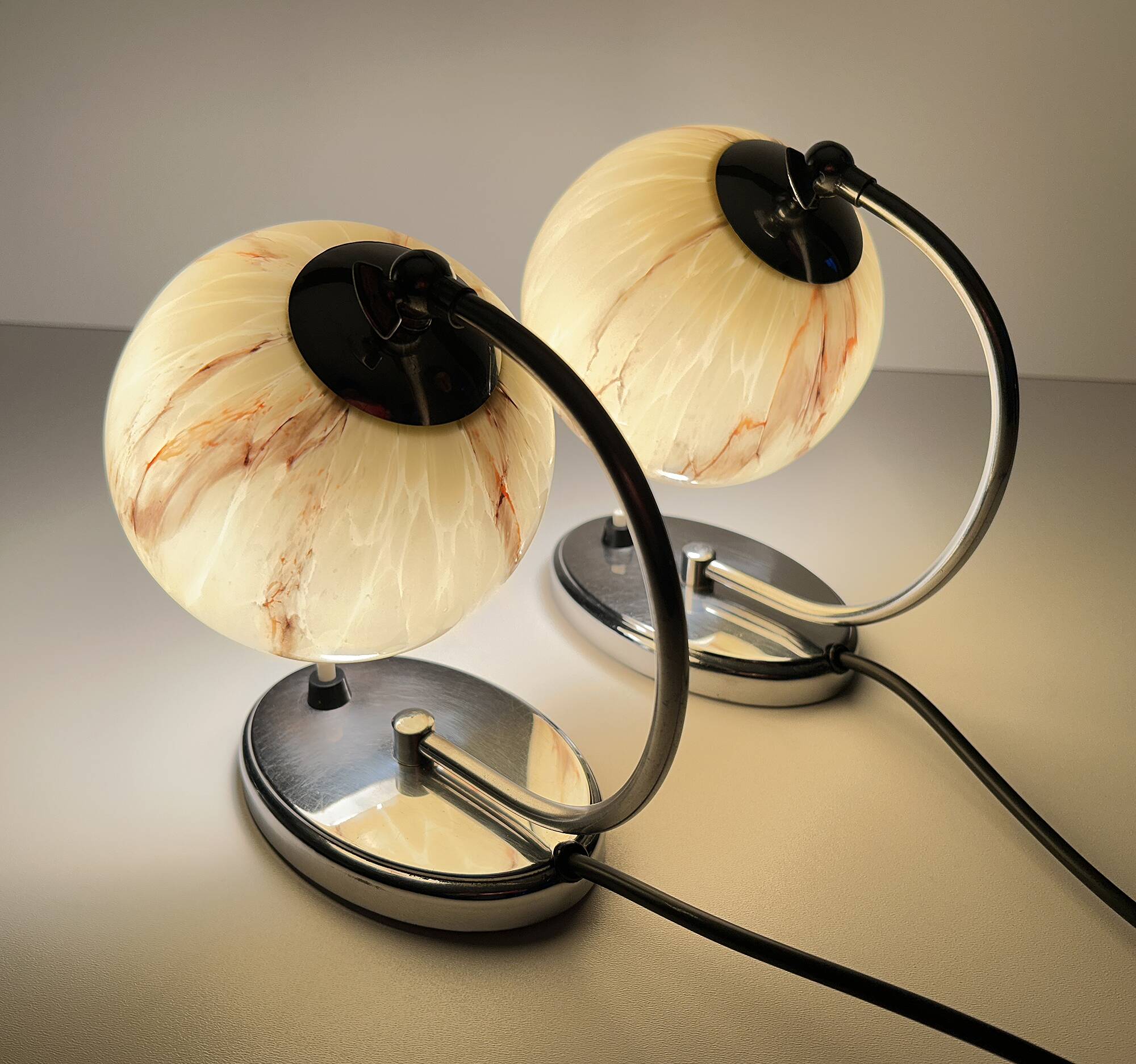 Pair of art deco lamps, chrome glass