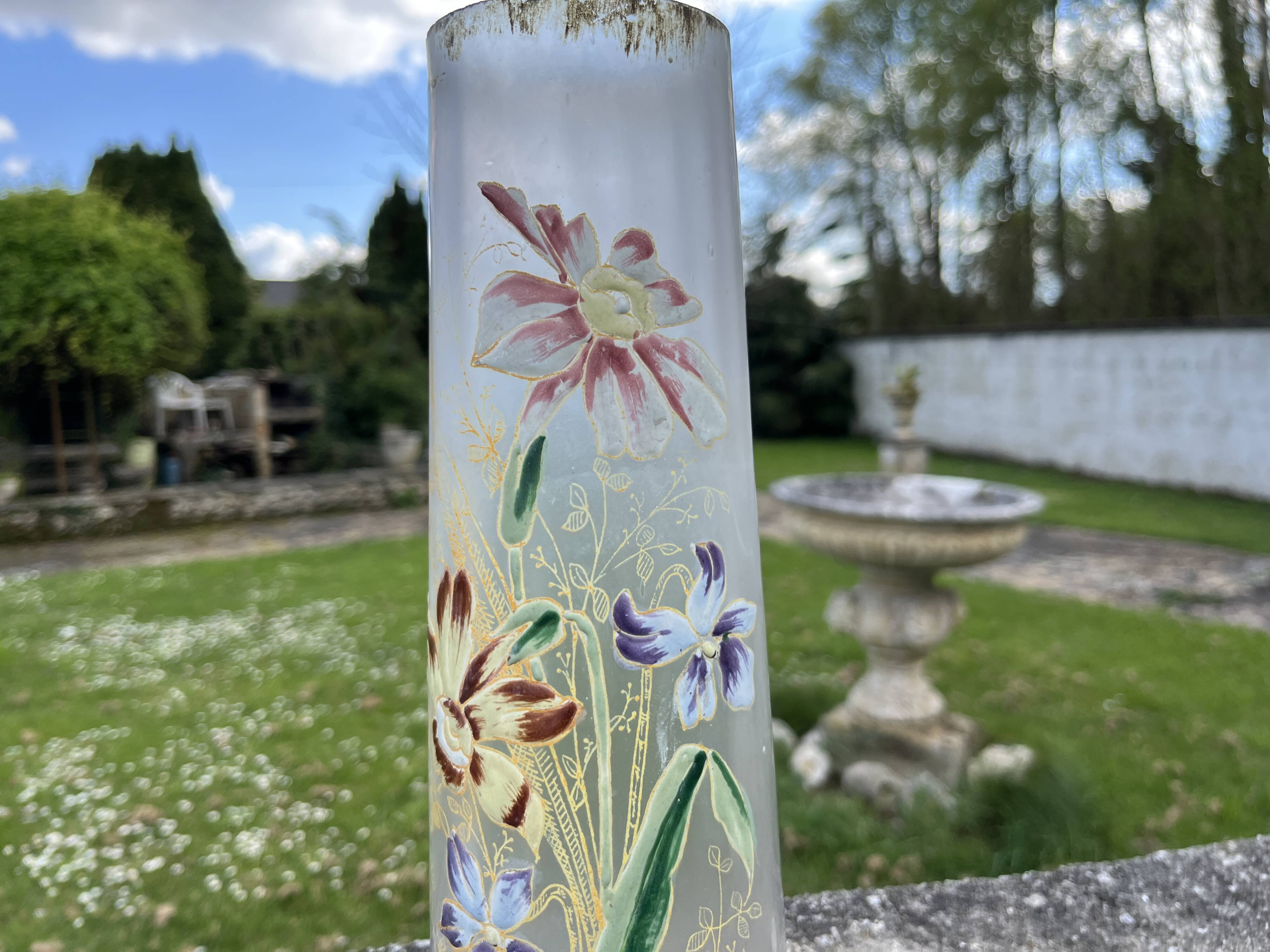 Cylindrical Art Nouveau vase with enamelled decoration of violets.