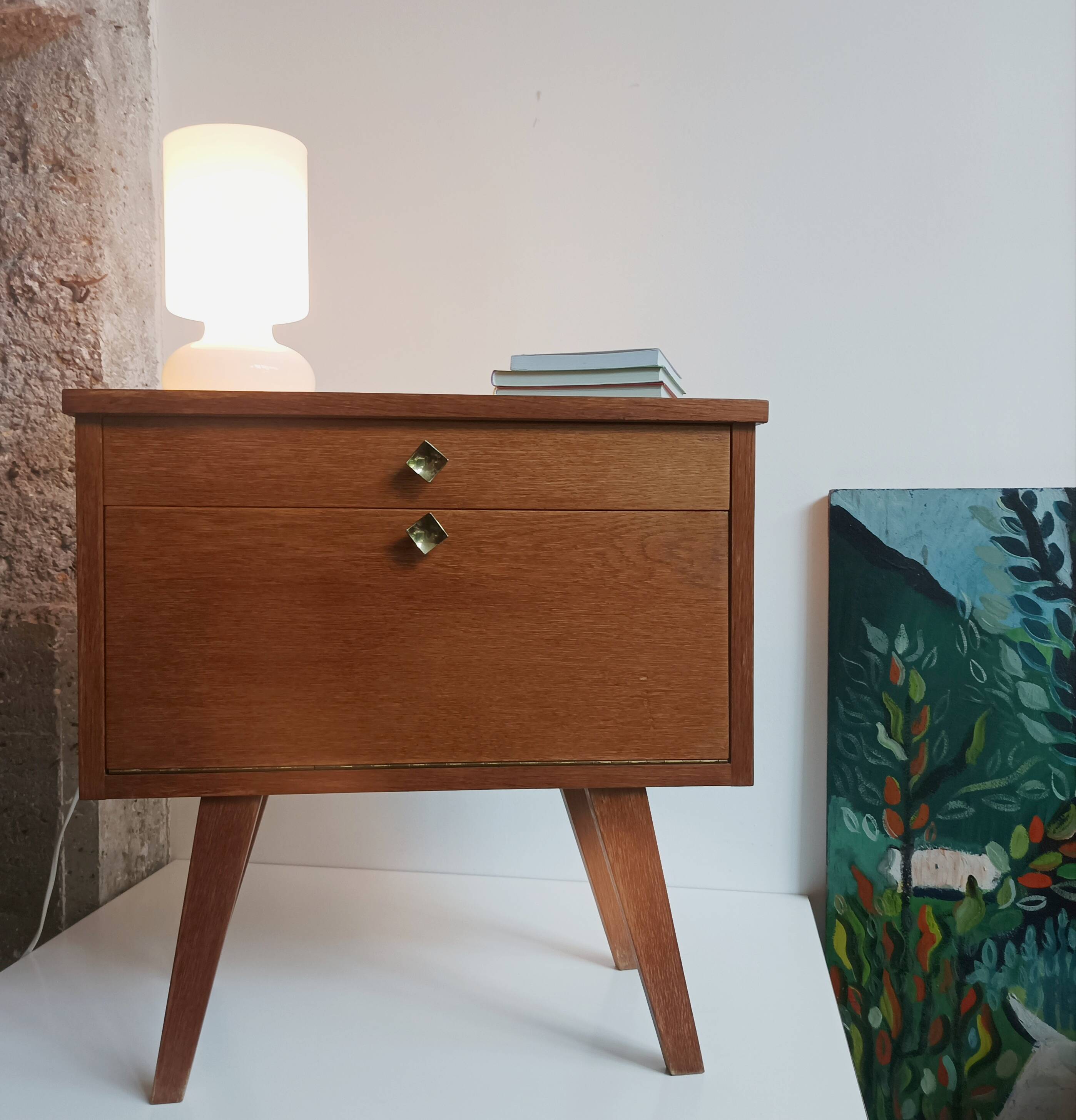 Wooden bedside table with vintage compass legs