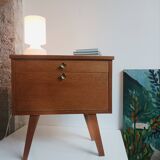 Wooden bedside table with vintage compass legs