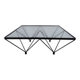 Glass coffee table with a metal frame.