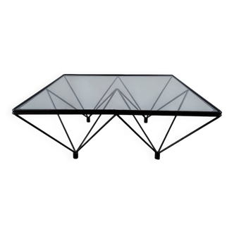 Glass coffee table with a metal frame.