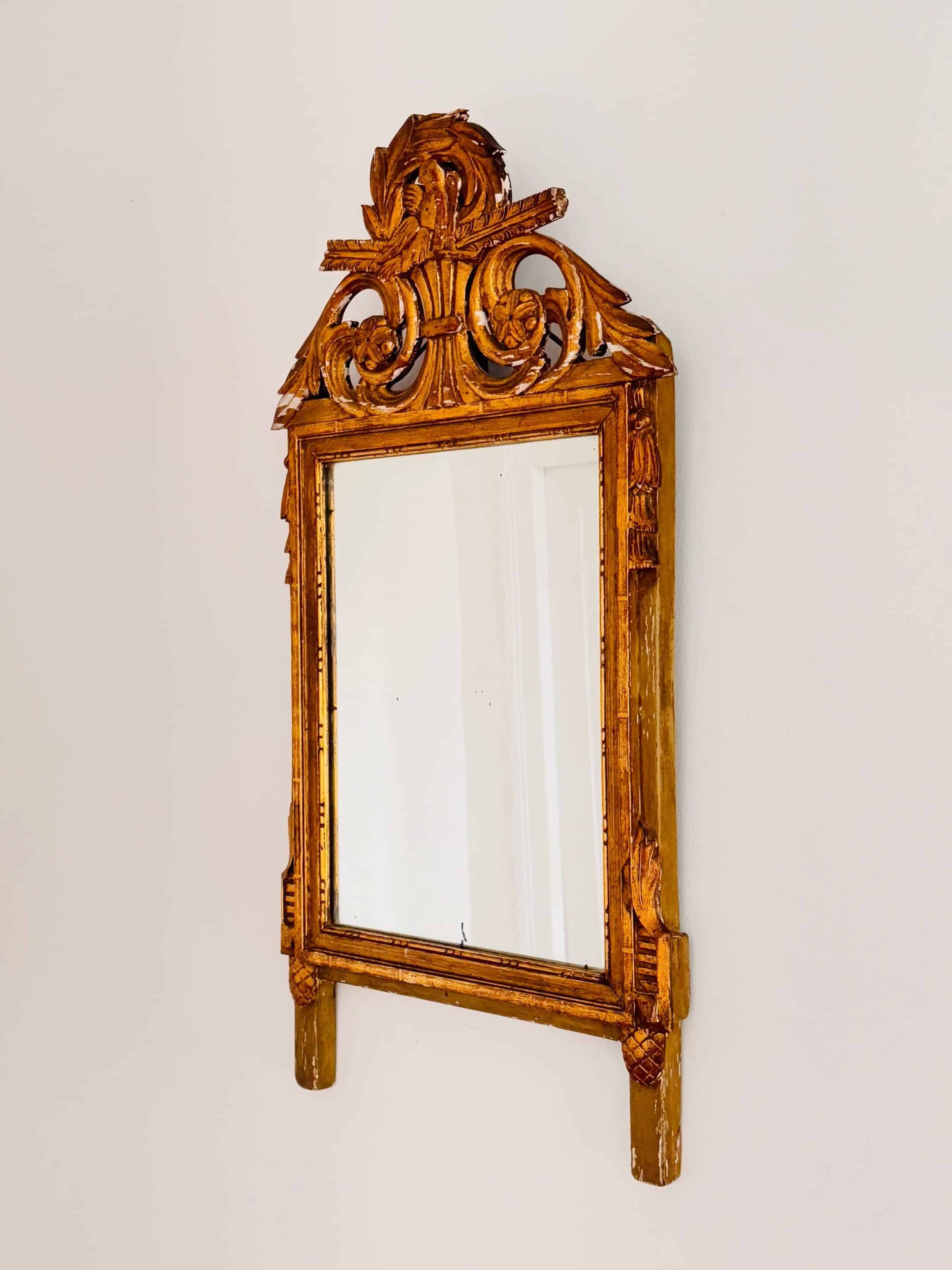 Louis XVI style giltwood pediment mirror