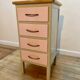 Beige and pale pink revamped 4-drawer bedside table