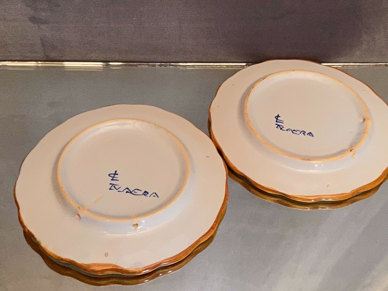 Pair of Talavera earthenware plates with floral decoration