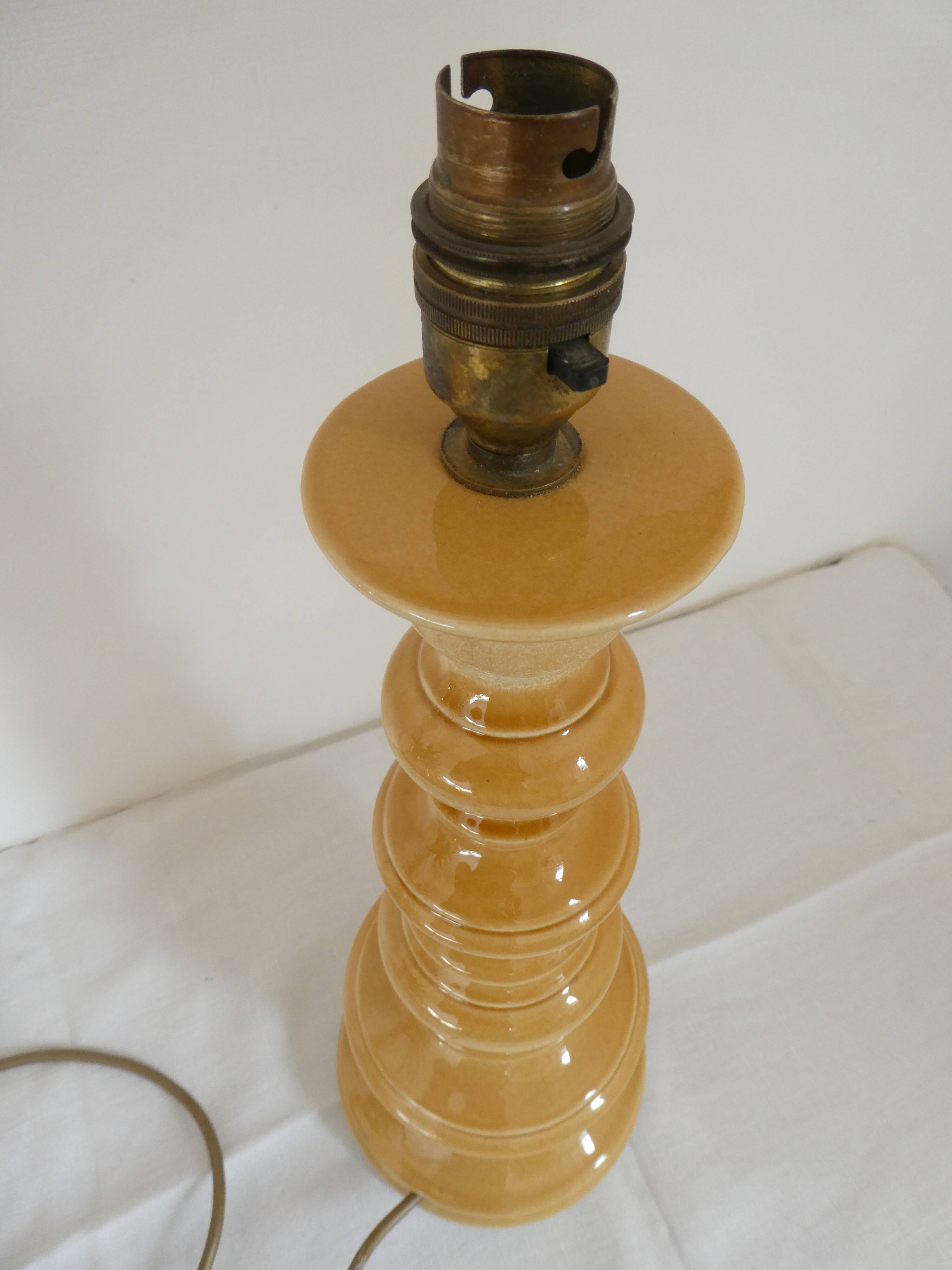 Large baluster-shaped lamp base in yellow and beige ceramic from the 1960s.
