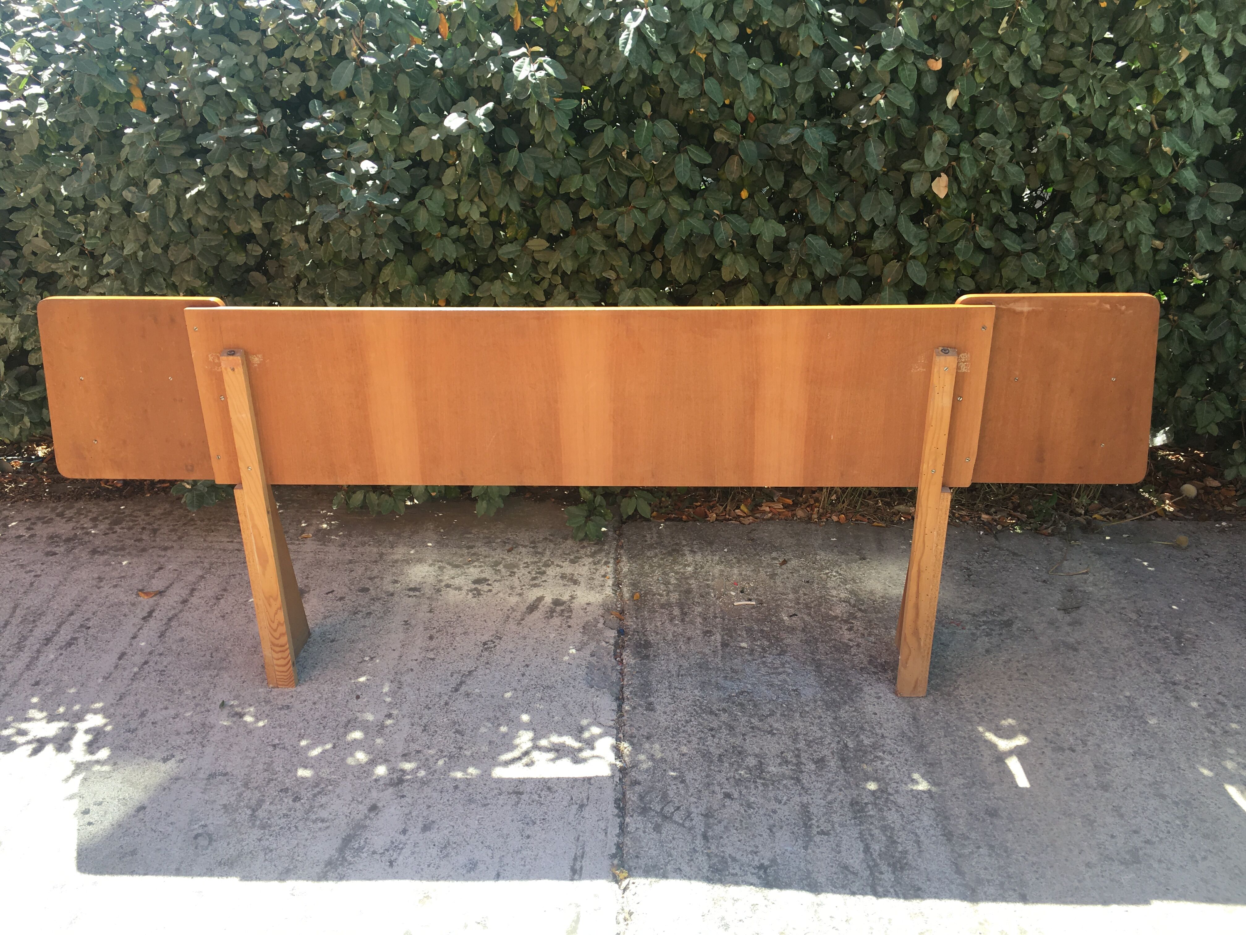 Vintage headboard with hanging bedside tables