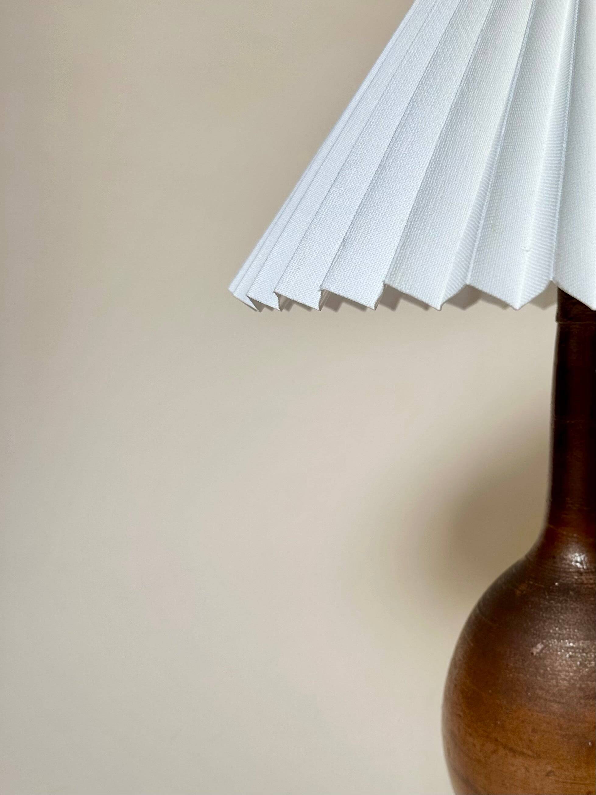 Stone lamp with pleated shade