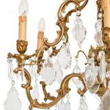 Louis XV style chandelier in gilded bronze with 6 light arms.