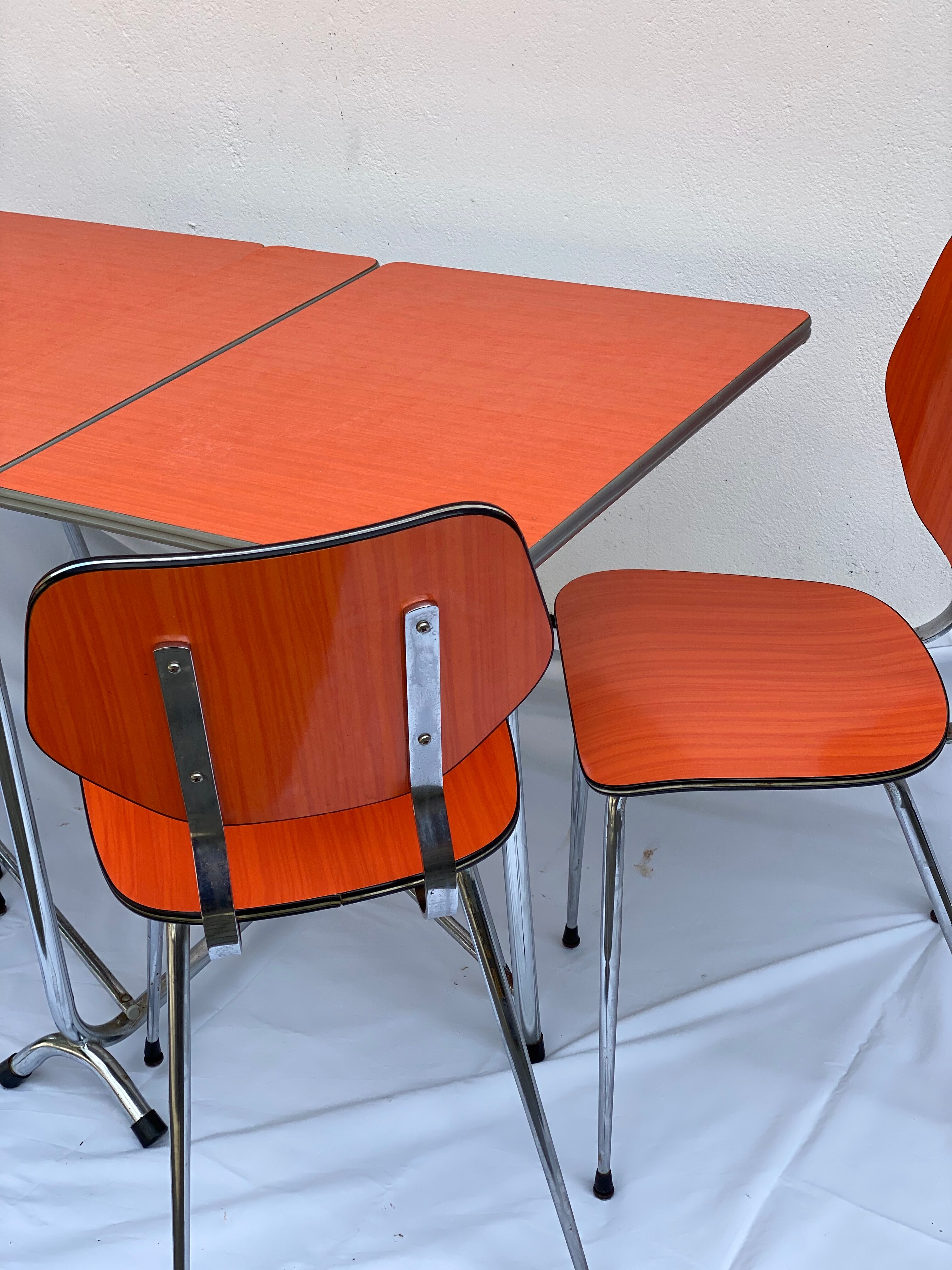 Orange formica table and 4 chairs