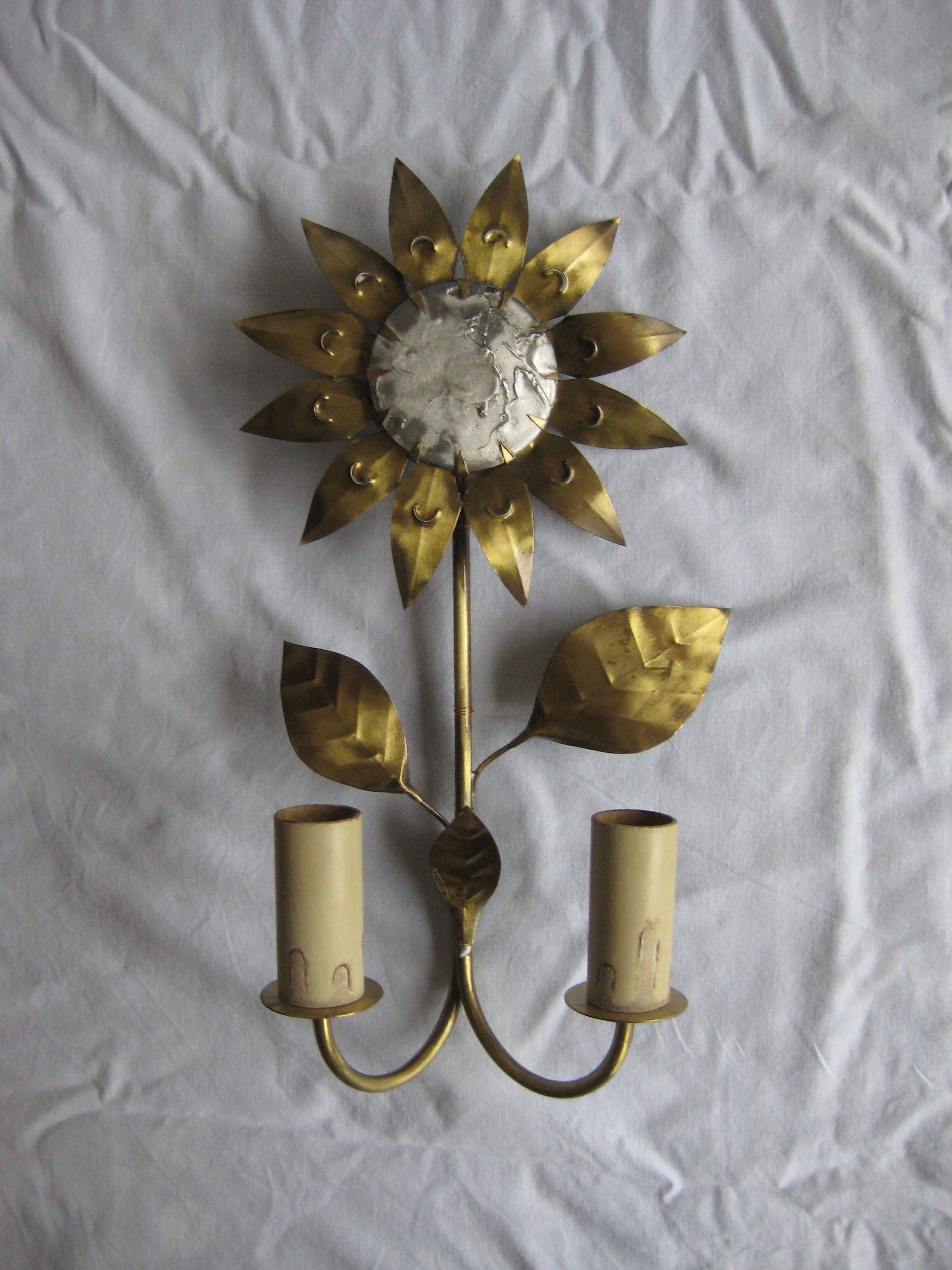 Brass sunflower sconces
