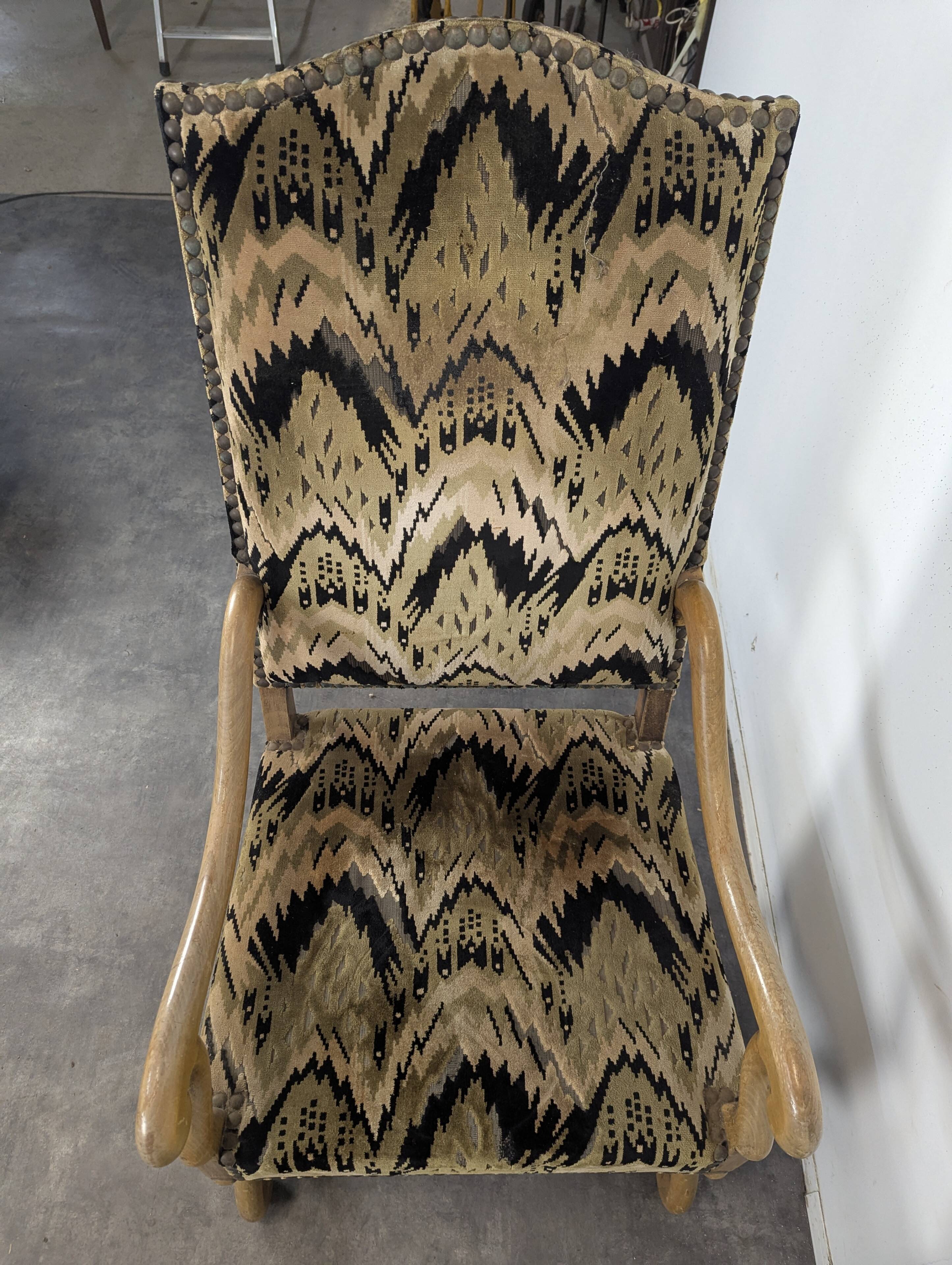 Louis XIII armchair with sheep bone in flame velvet