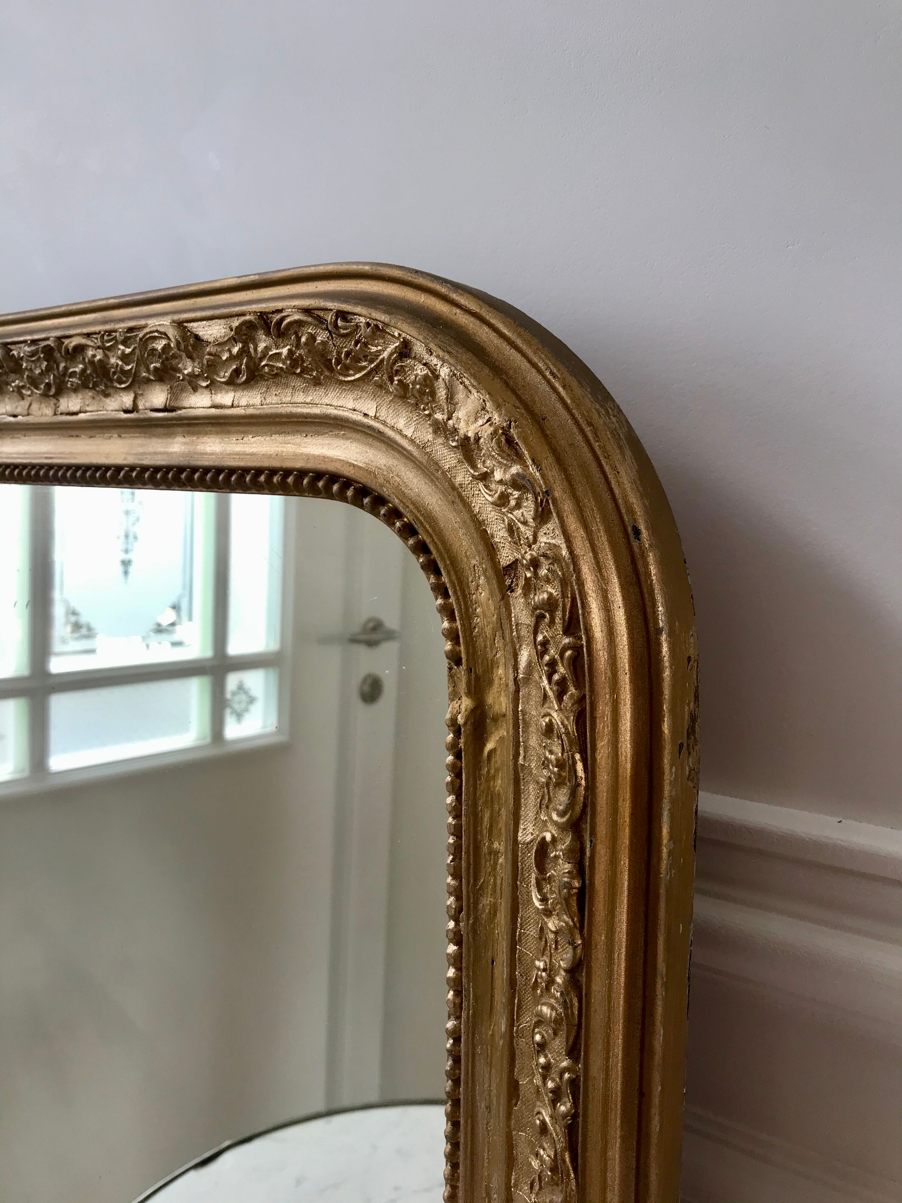 Wooden mirror and gilded stucco early twentieth century