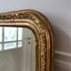 Wooden mirror and gilded stucco early twentieth century