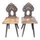 Pair of Alsatian chairs from the late 18th century with carved backs.