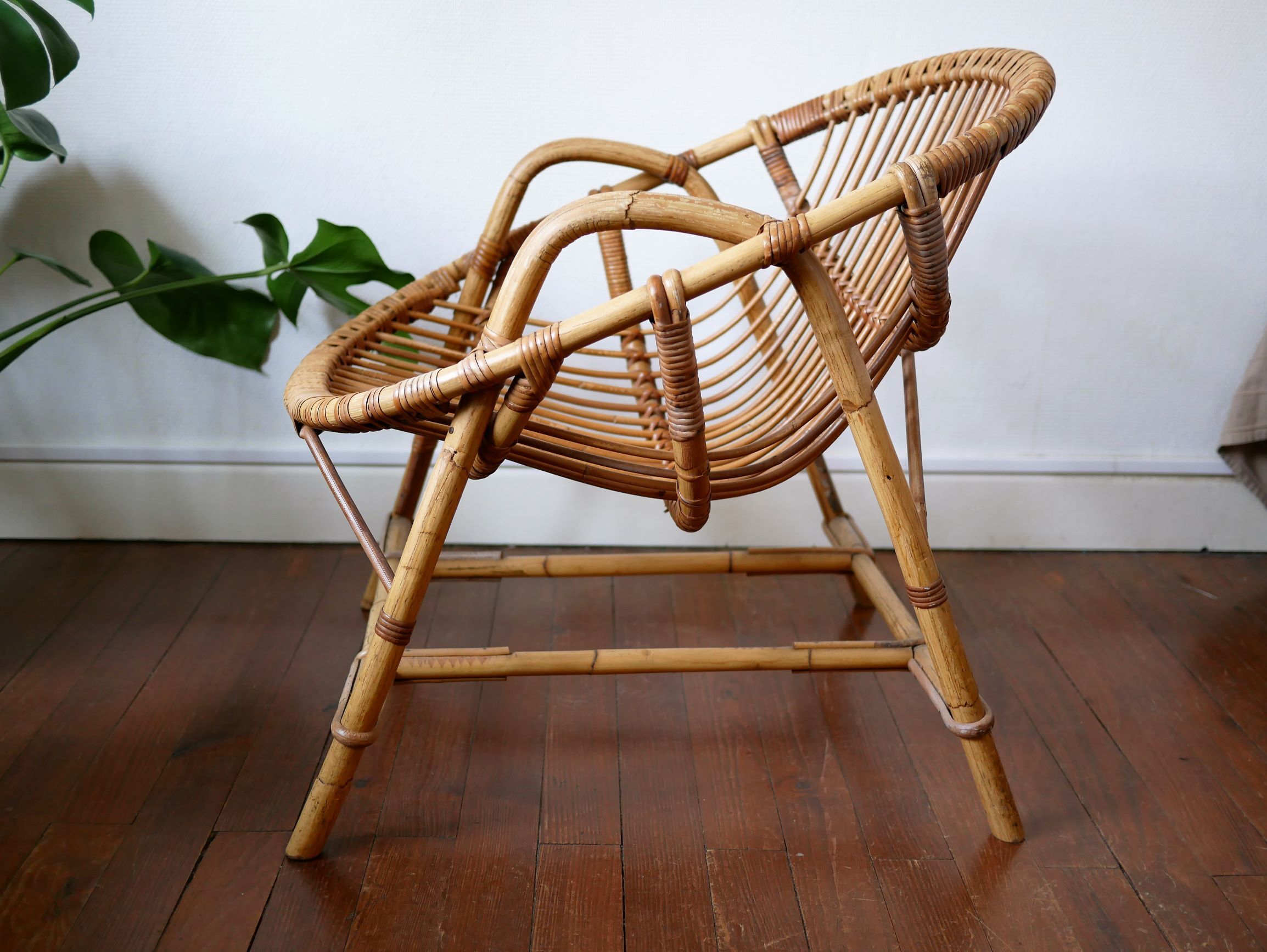 Vintage rattan "shell" armchair