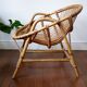 Vintage rattan "shell" armchair