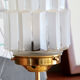 Table lamp in old glass art deco skyscraper and brass vintage bedside lamp