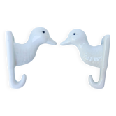2 old white porcelain "duck's head" tea towel hooks. rare model