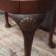 English piano stool in Louis XV style made of mahogany in a bean shape.