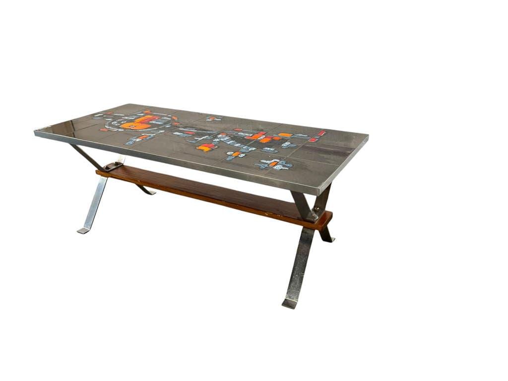 Vintage ceramic coffee table with chrome and wood accents.