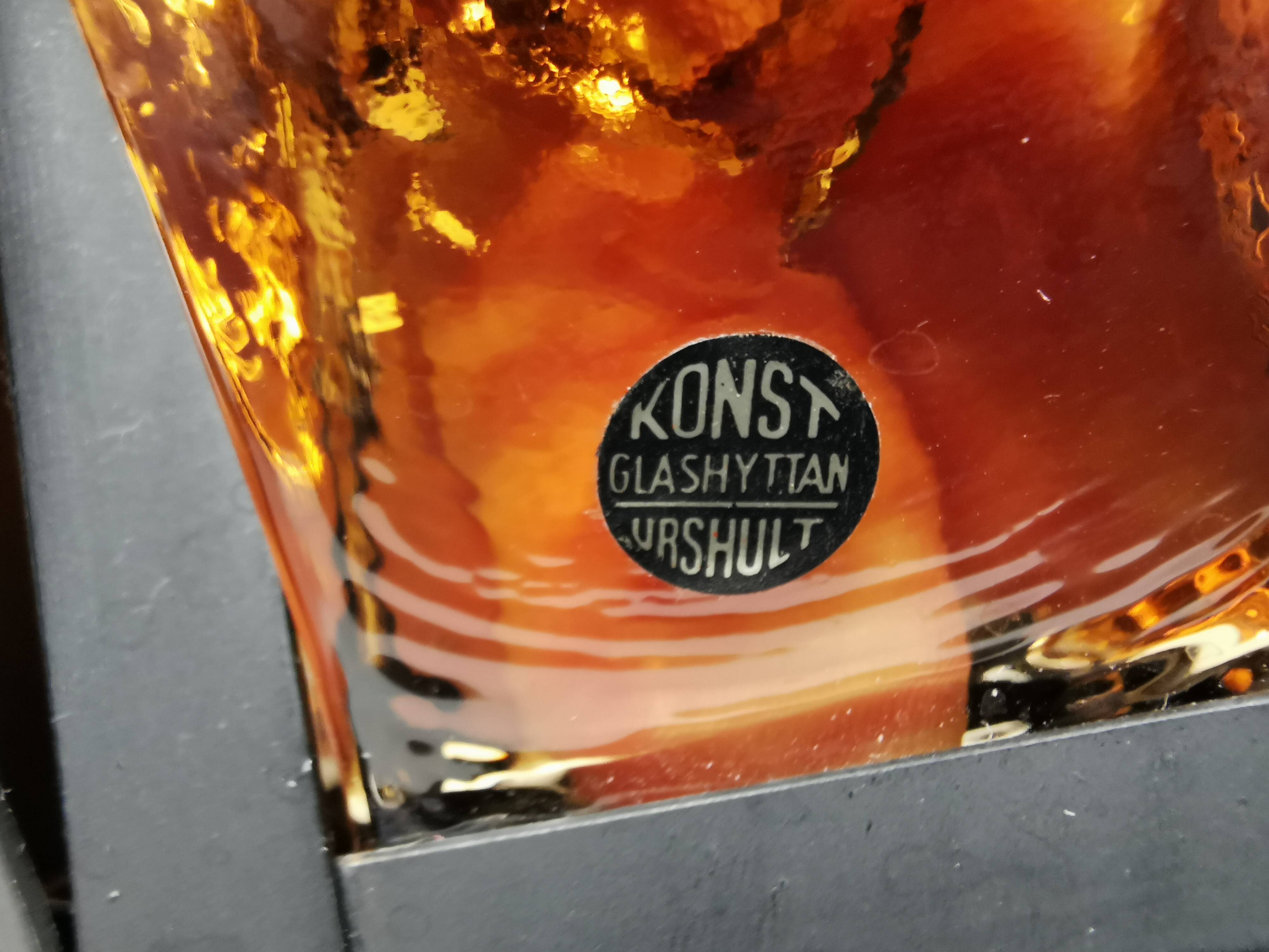 Bougeoir en fonte et verre pressé dur de couleur orange