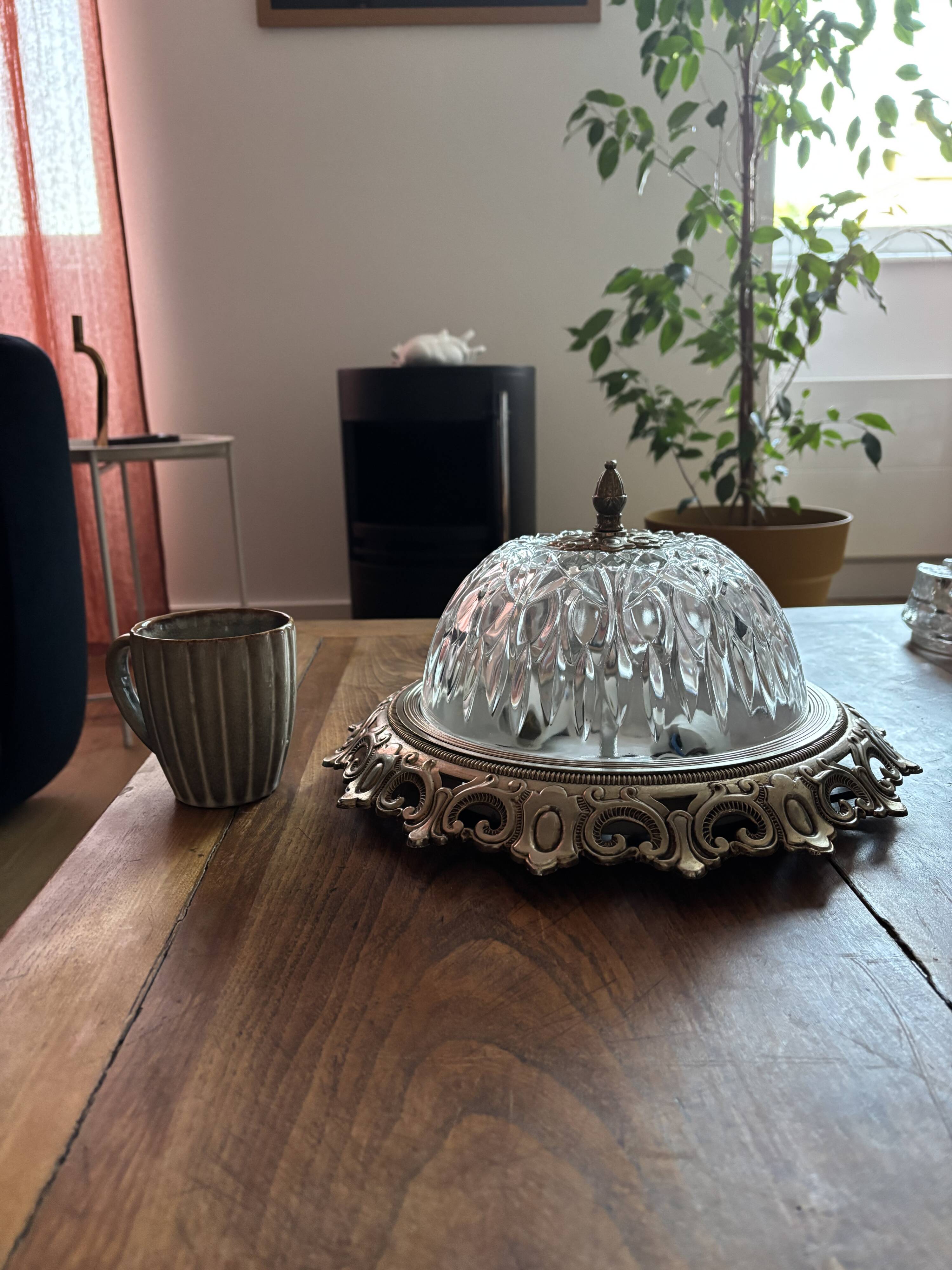 Gold ceiling light with chiseled glass globe