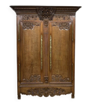 19th-century Norman wedding armoire in blonde oak.