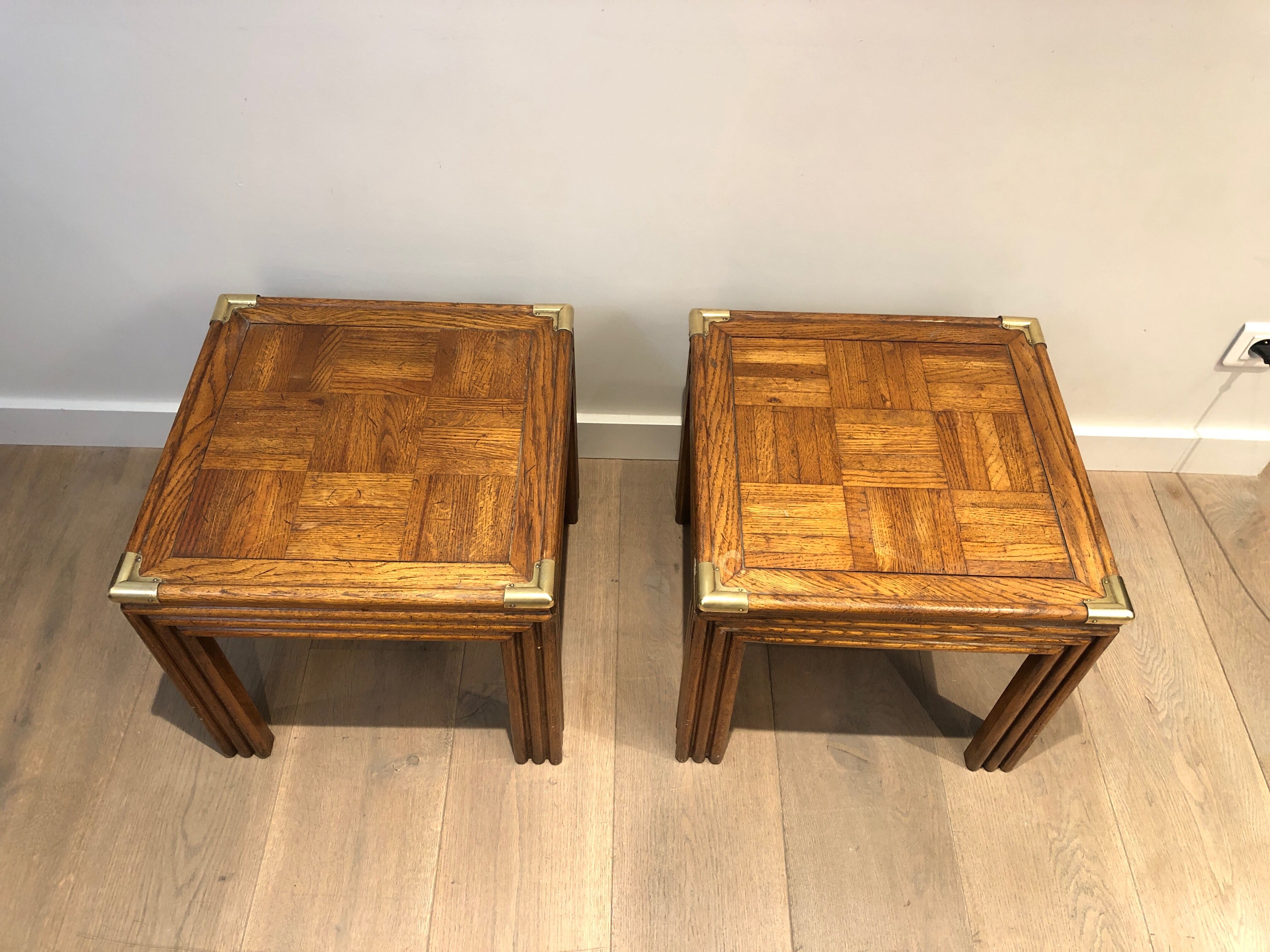 Pair of wooden and brass sofa ends