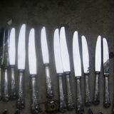 Part of art nouveau style cutlery set. made of silver metal. 48 pieces.