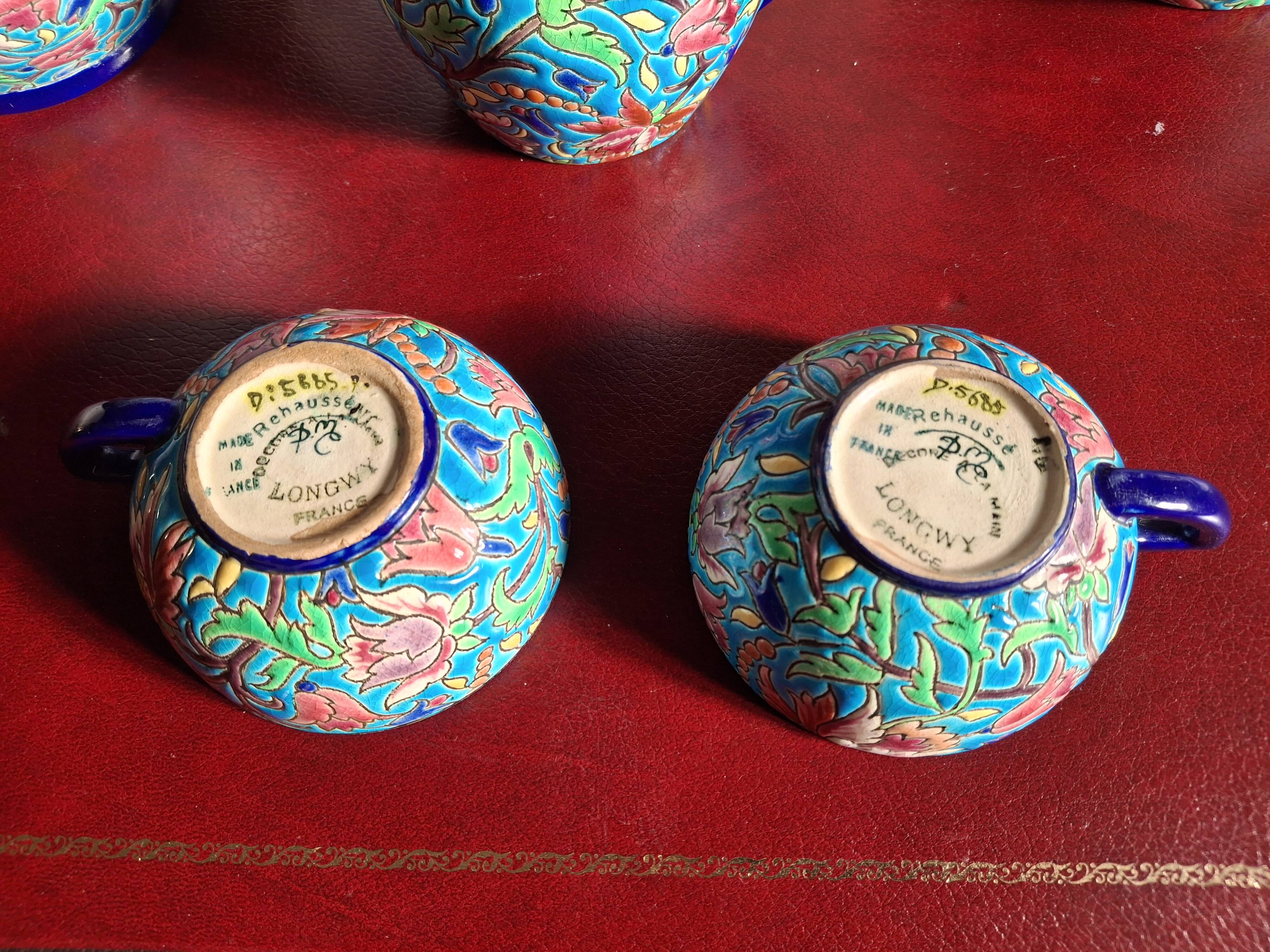 Cloisonné enamel tea service from Longwy in excellent condition.