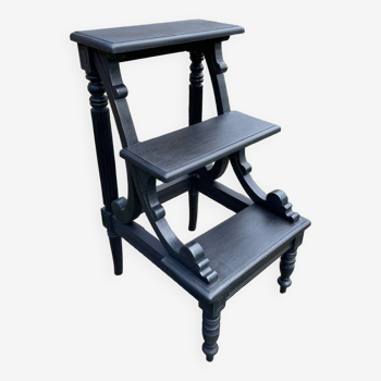 Old library stepladder in blackened wood