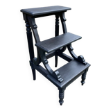 Old library stepladder in blackened wood