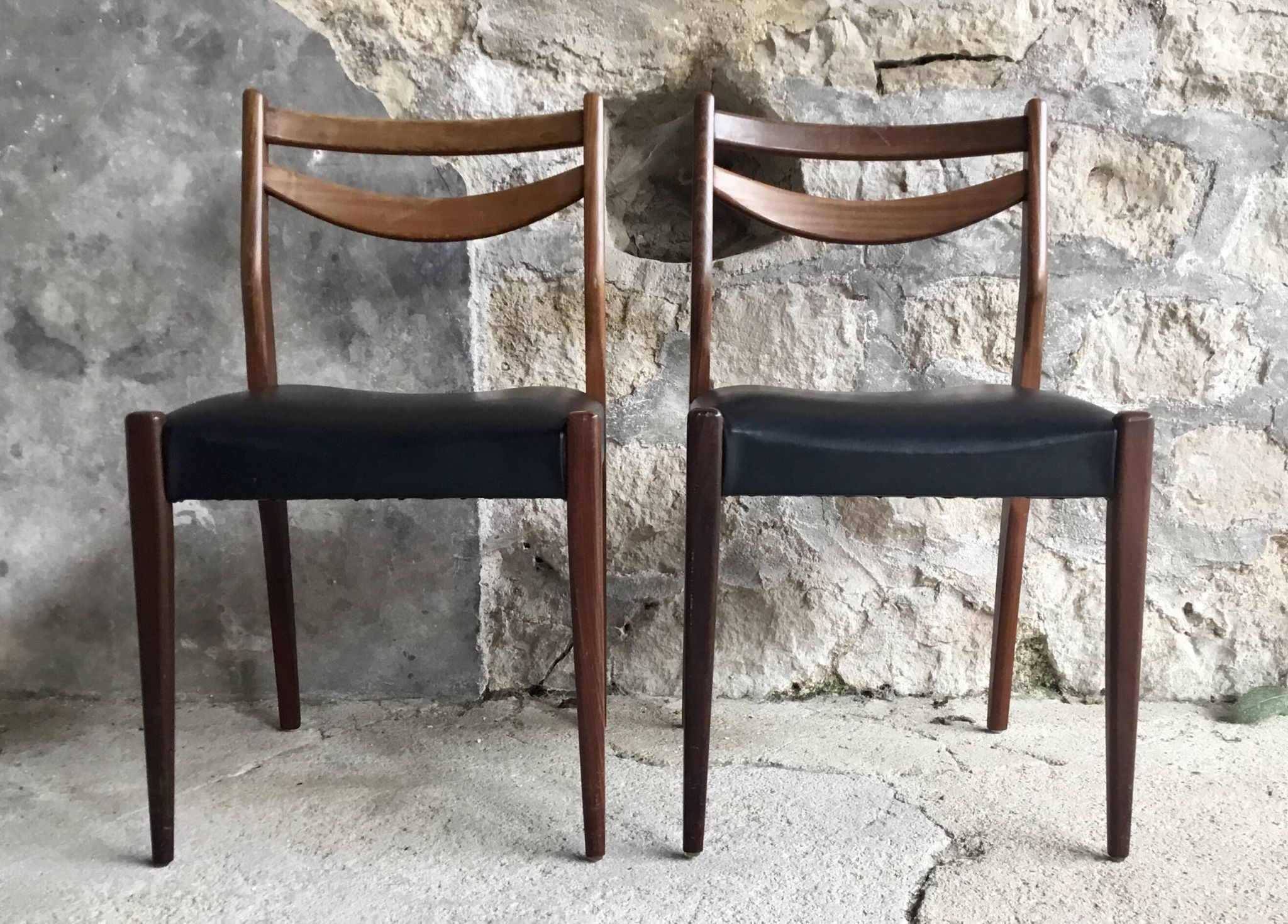 Pair of Scandinavian chairs Ameublement NF black imitation leather and teak - 1960