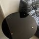 Vintage round black glass coffee table, 1950s