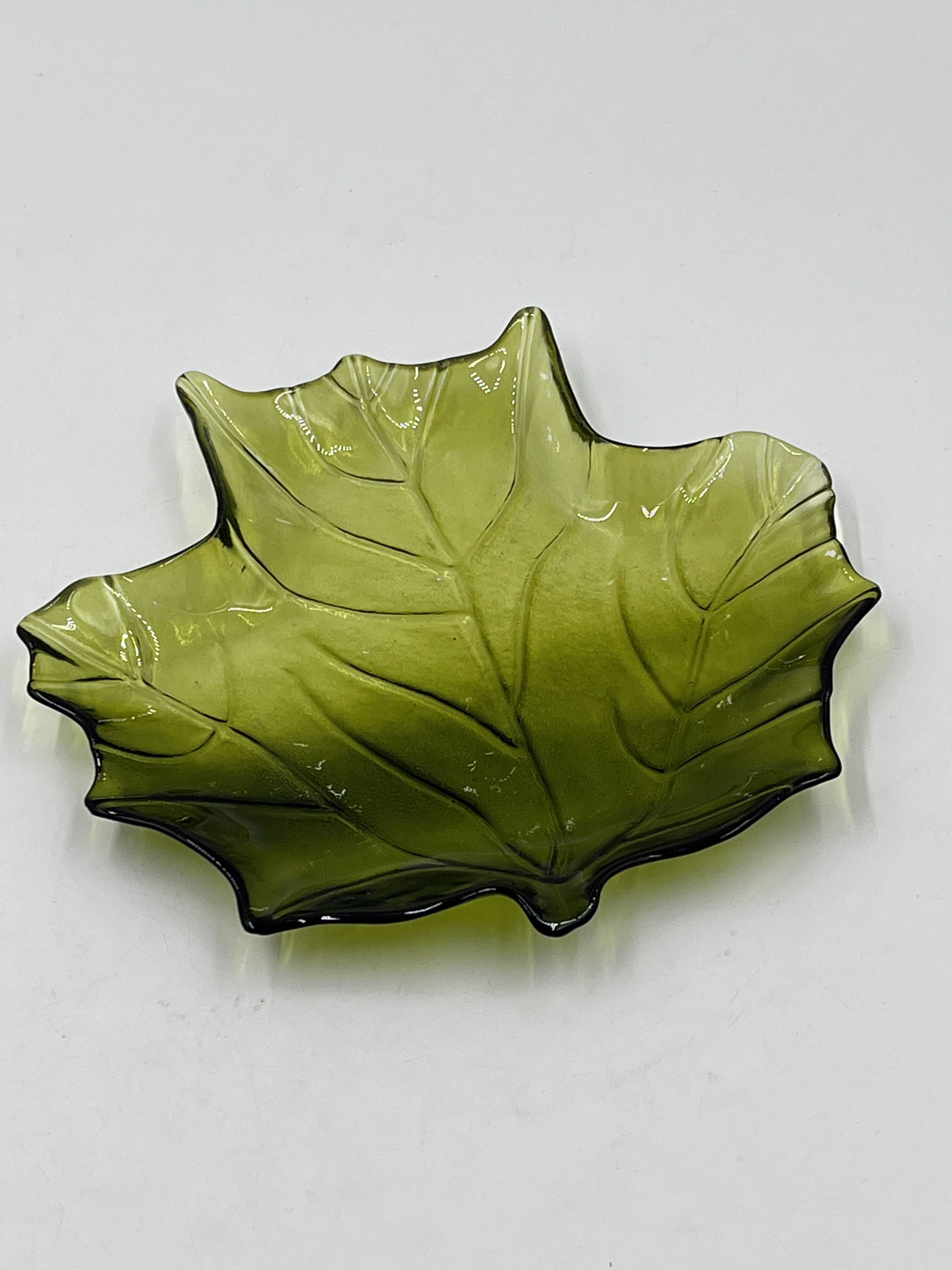 Vintage green glass leaf catchall from the 1970s.