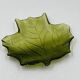 Vintage green glass leaf catchall from the 1970s.