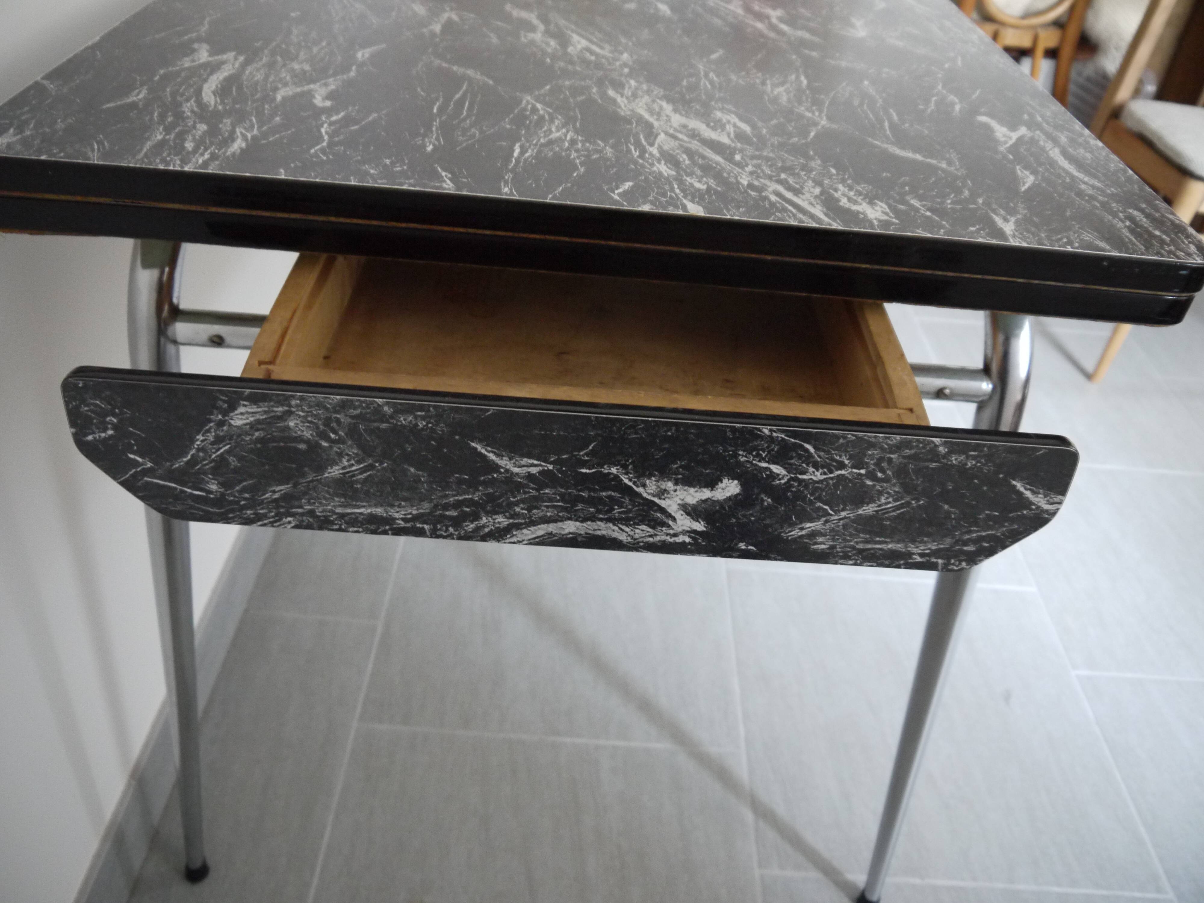 Black and white marbled formica table