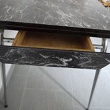 Black and white marbled formica table