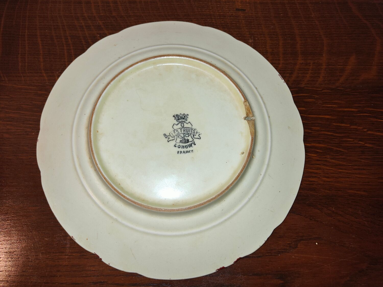 Faience plate in Longwy enamels signed Léa Valentin Les Fruits