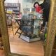 LARGE LOUIS XV STYLE ROCAILLE MIRROR IN GILT STUCCO FORAL DECOR ON PEDAL