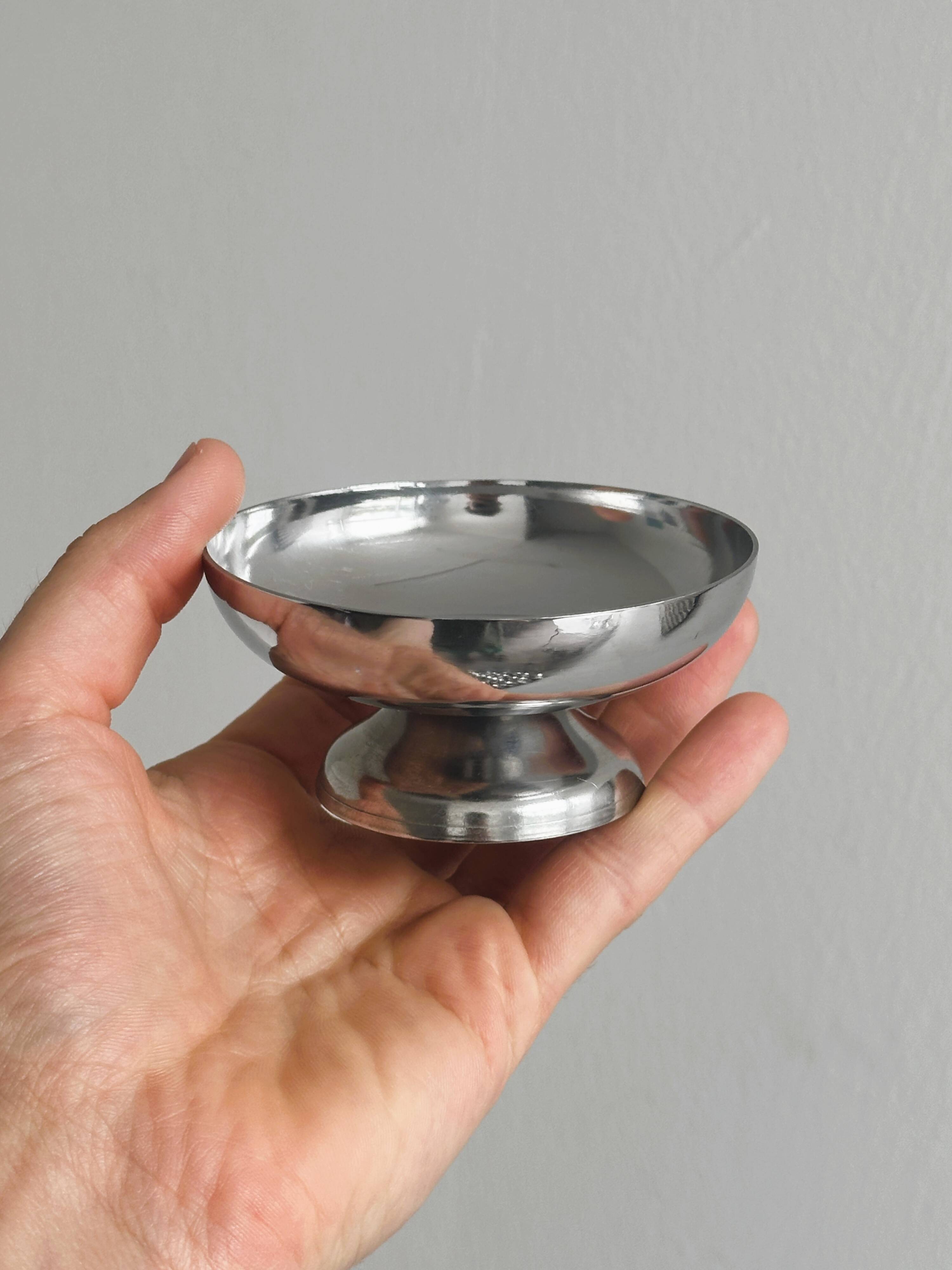 6 stainless steel dessert cups.