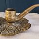 Brass candle holder.