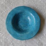 Empty turquoise raku pocket
