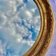Old Oval Wall Mirror in Gilded Wood late nineteenth early twentieth