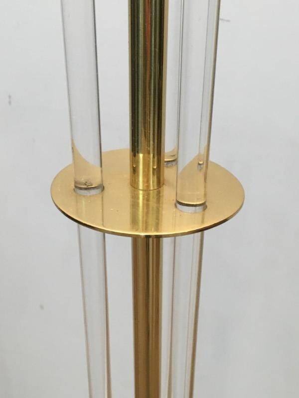 Designer floor lamp in gilded brass and plexiglass