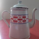 White enamelled sheet metal coffee maker with red and blue patterns